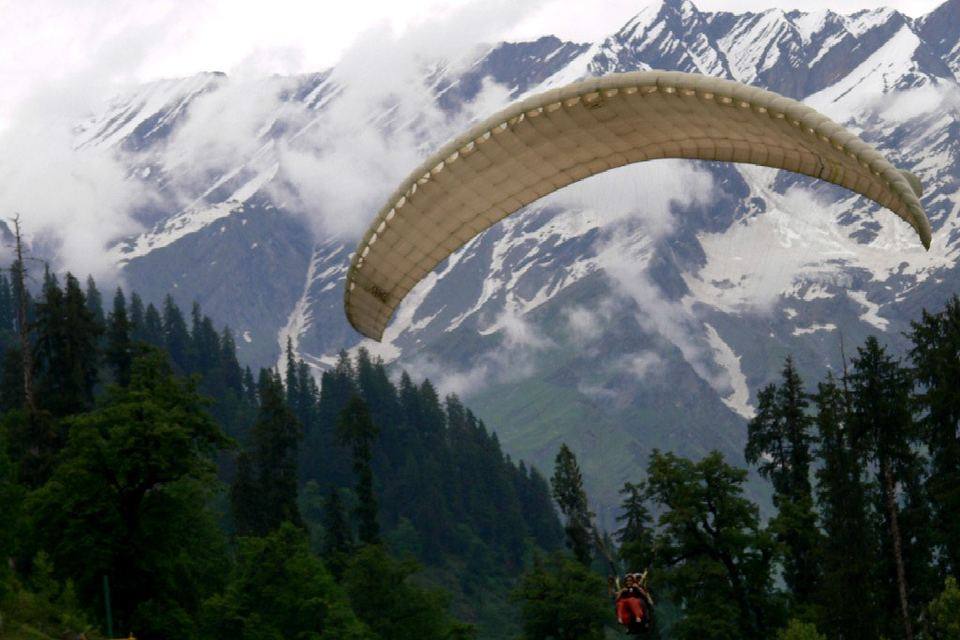 A paraglider over Solang Valley near Manali, Himachal Pradesh